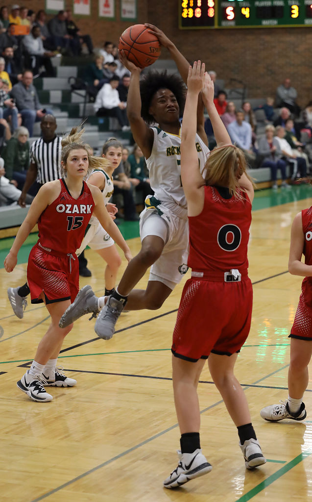 Sanaa' St. Andre goes up for a basket